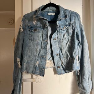 Distressed denim jacket